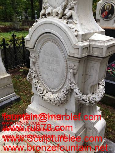 marble monuments,religious figures,monuments tombstones